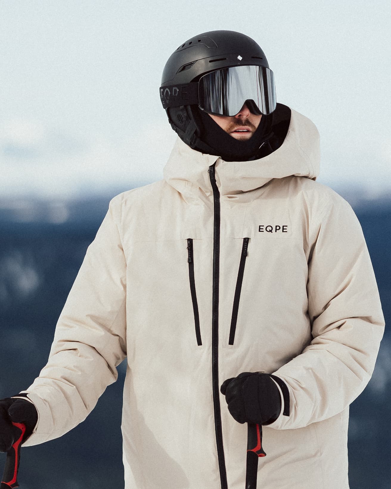 Person in a beige ski jacket