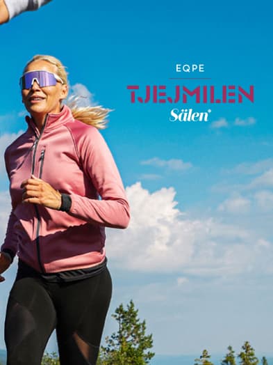 Woman running outdoors in a pink jacket and sunglasses against a blue sky, with "Tjejmilen Sälen" text in the background.