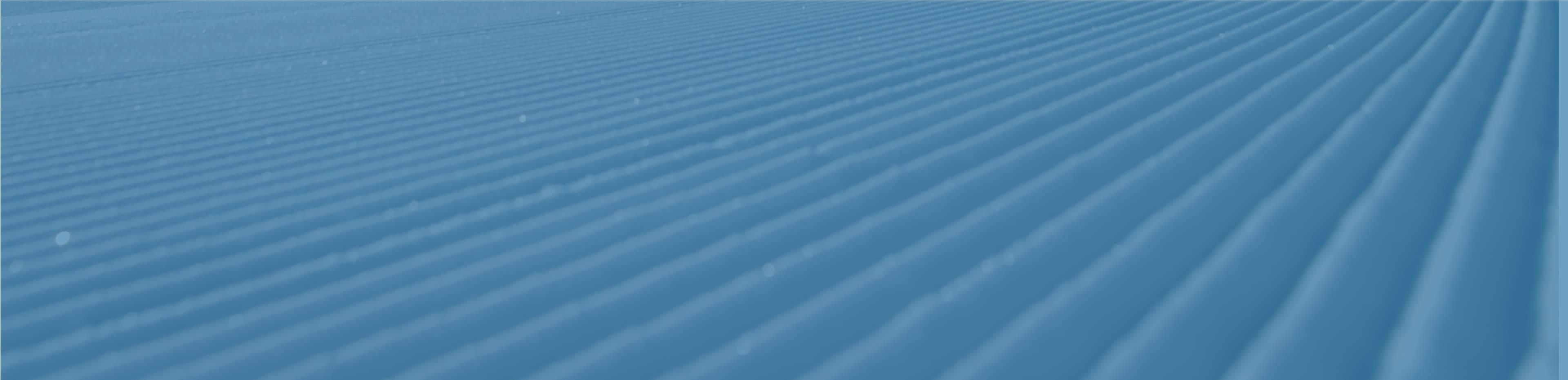 Close-up of neatly groomed snow.