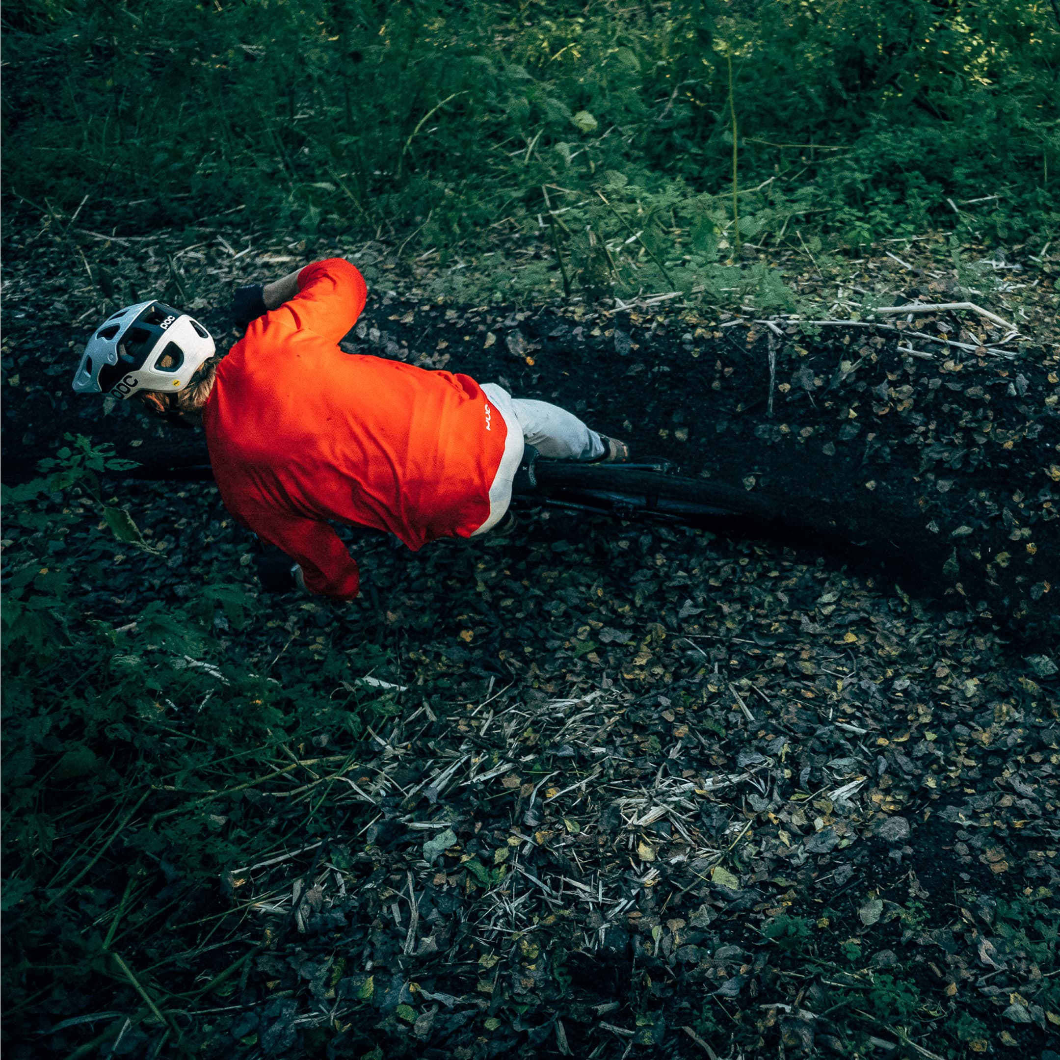 Person biking downhill