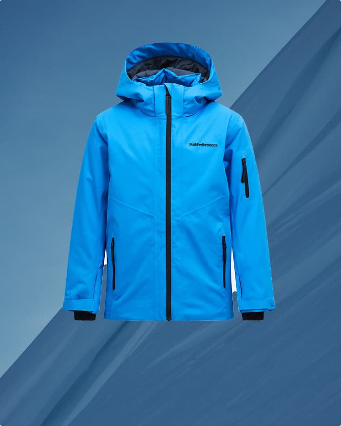 Blue hooded jacket against a gradient blue background, featuring zippered pockets and a subtle logo on the chest.
